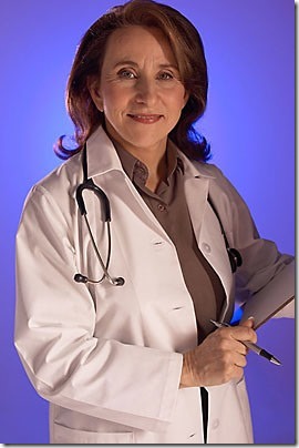 Doctor with stethoscope around her neck holding clipboard uid 1173327